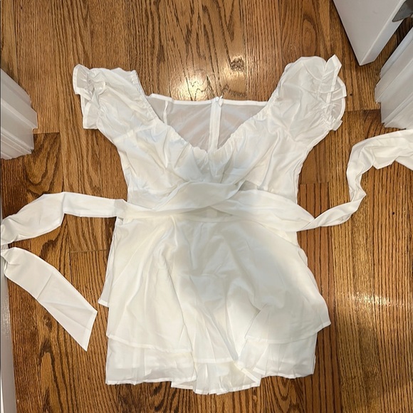 White Ruffled Tie Front Jumpsuit - Picture 1 of 3